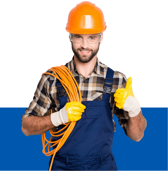 Smiling construction worker with an orange hard hat and protective gloves holds a coiled orange cable, giving a thumbs-up gesture.